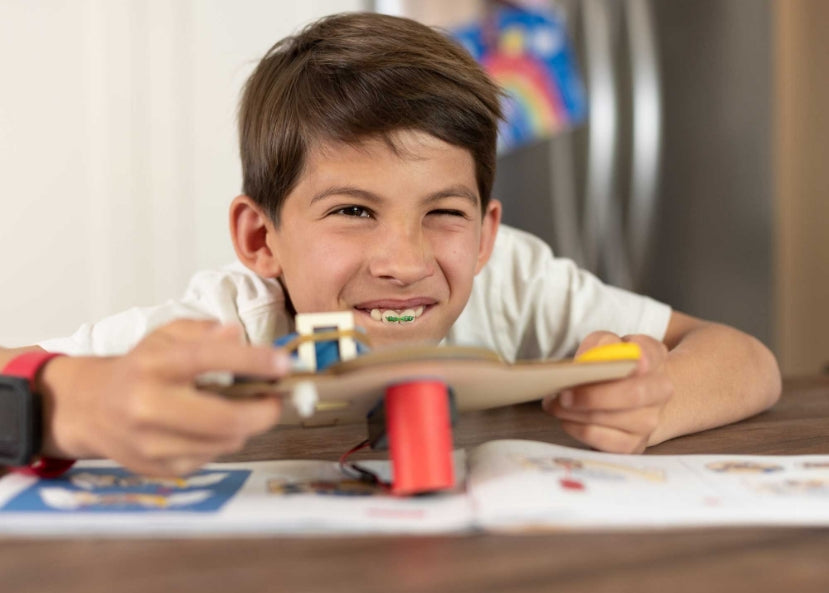 Photo of a Boy Aiming His Disc Launcher