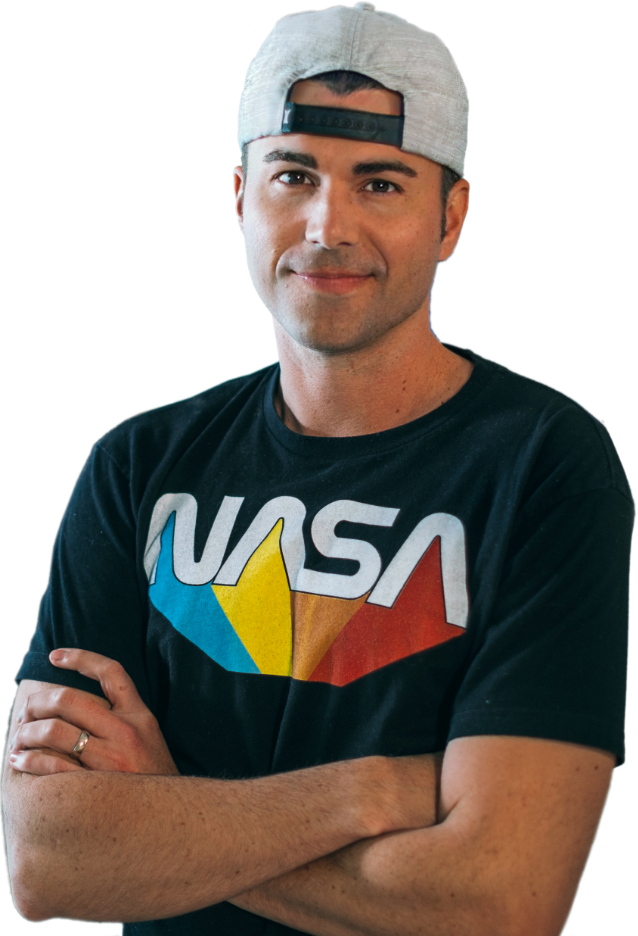 Photo of Mark Rober in a NASA T-Shirts, Arms Folded